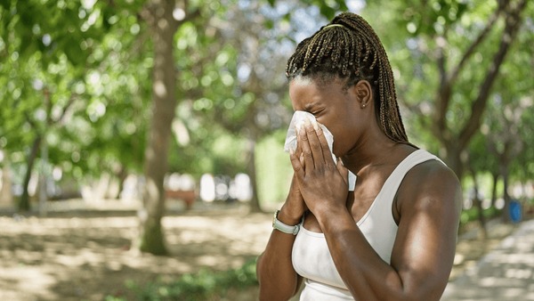 african american woman using tissue 600nw 2395406351 1